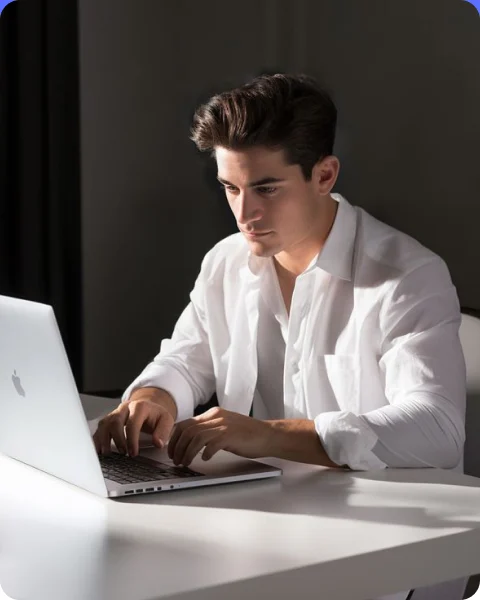 Person managing their ChatCrafter subscription on a laptop